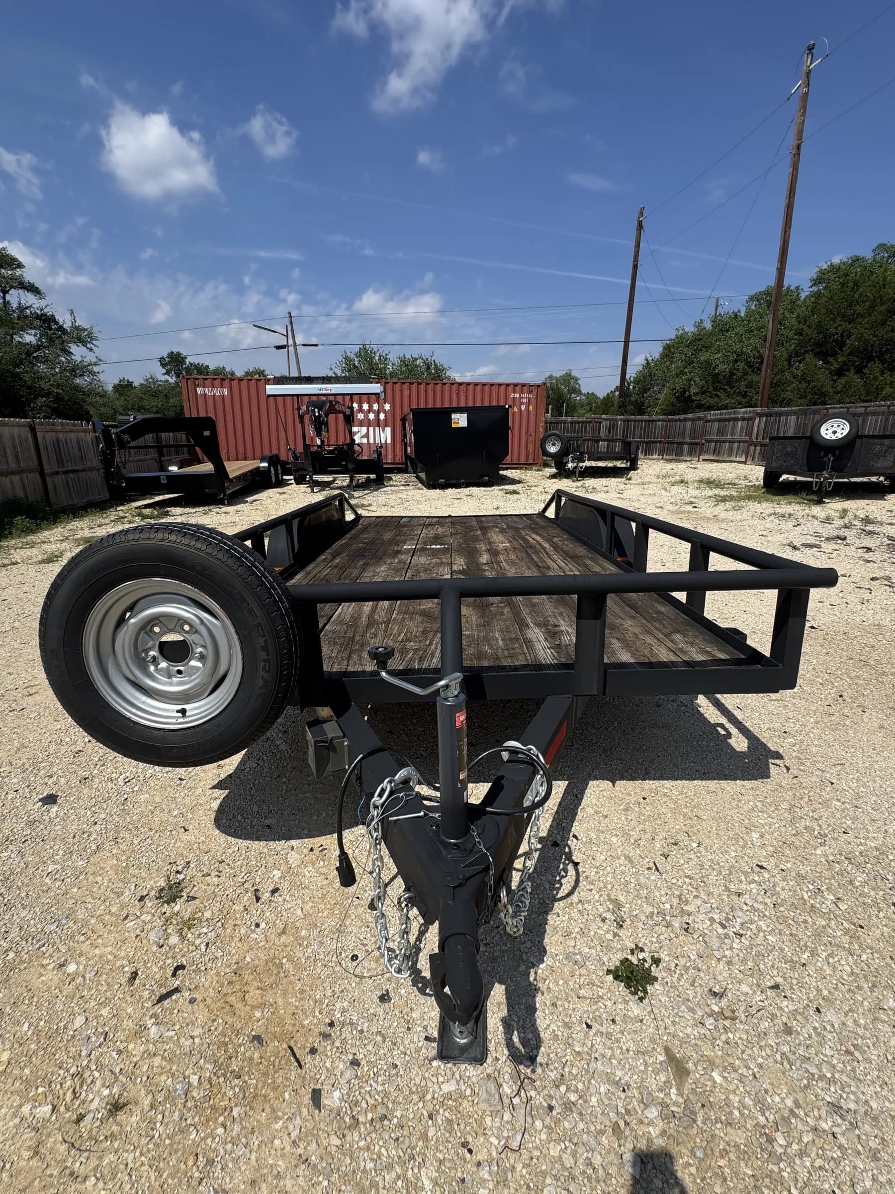 RedLine 16-foot utility trailer with wooden deck available for rent